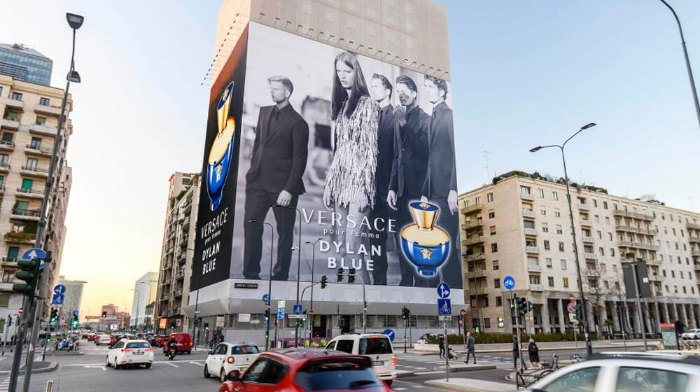 The impressive billboard in Milan featuring the Versace Dylan Blue pour Femme ADV campaign during the day.